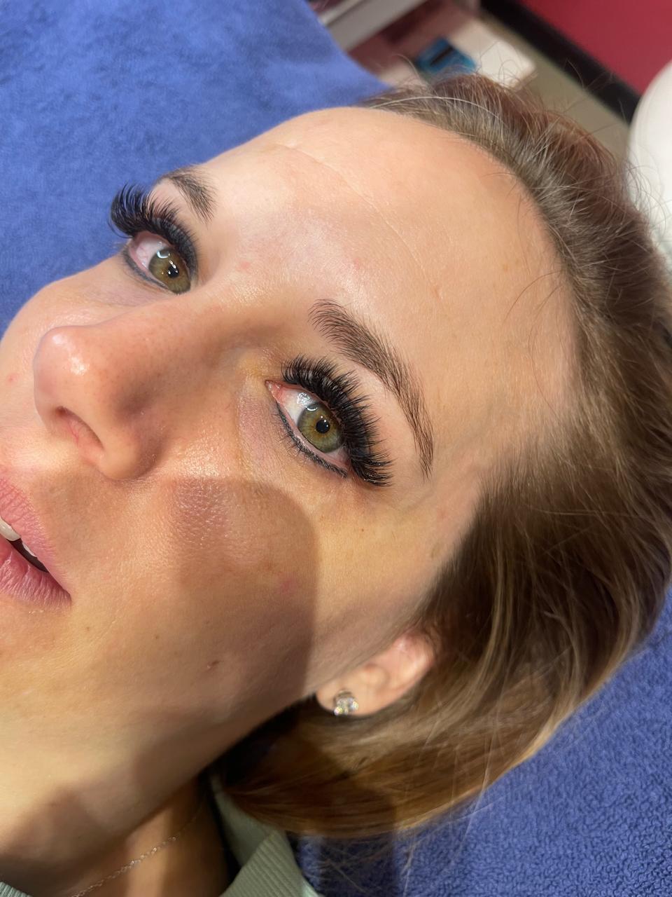 Green-eyed Mimmo Beauty client showing a fuller lash result.
